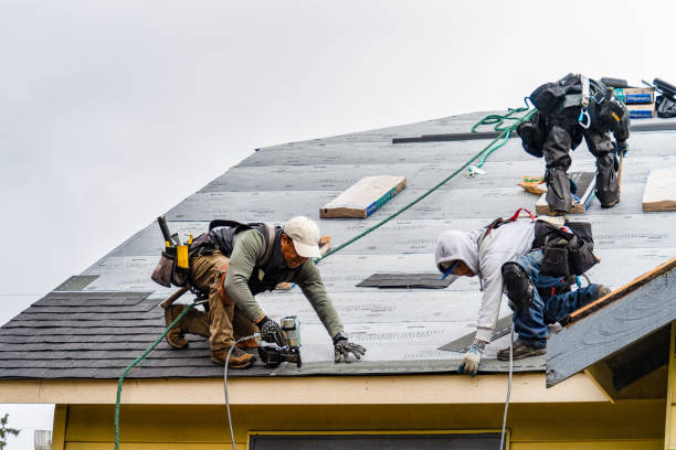 Professional Roofing technician working in Cranston, RI